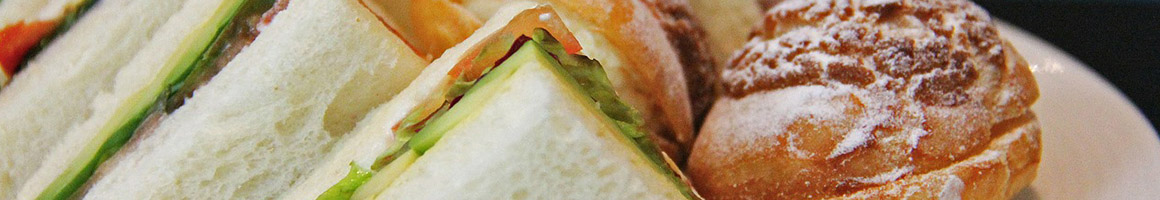 Eating Deli Sandwich at Rhineland Deli restaurant in Thousand Oaks, CA.